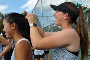 Girls tennis varsity team plays in memory of Denise Schmidt