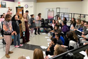 WVHS chorus students visit, inspire 8th-grade counterparts