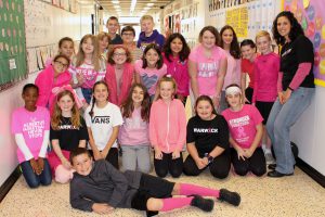 Middle school sparkles in pink to support breast cancer awareness, support services and funding