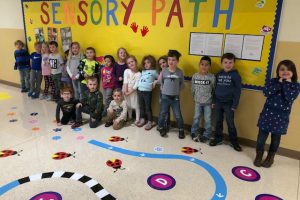Happy students are thrilled to explore Sanfordville Elementary’s new Sensory Path Hallway