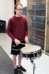 Owen Machingo playing drums