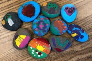 PIE 3-4 students’ painted rocks going to Yuma