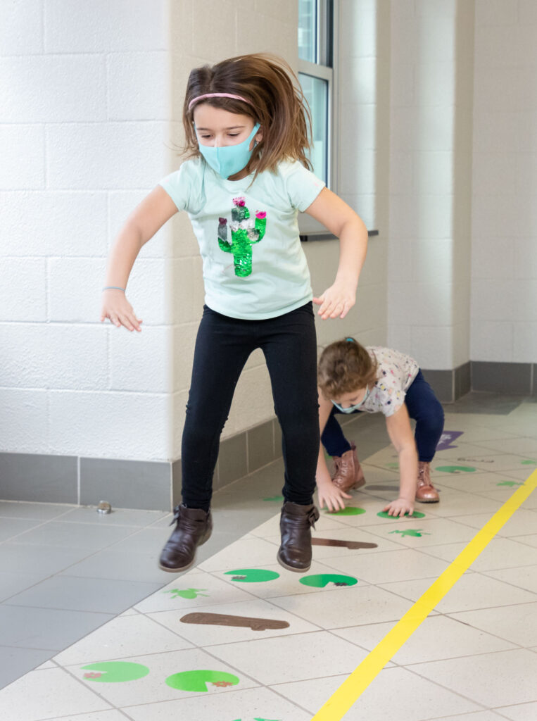 Kindergarteners use the new sensory path at Pine Island Elementary School on Jan. 22, 2021.
