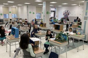 Park Avenue students share animal research projects with museum walk