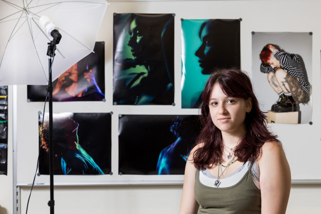 Warwick Valley High School senior Isabel Coppola poses with some of her photographs