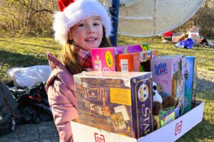 Students help wrap up WTBQ toy drive for military tots