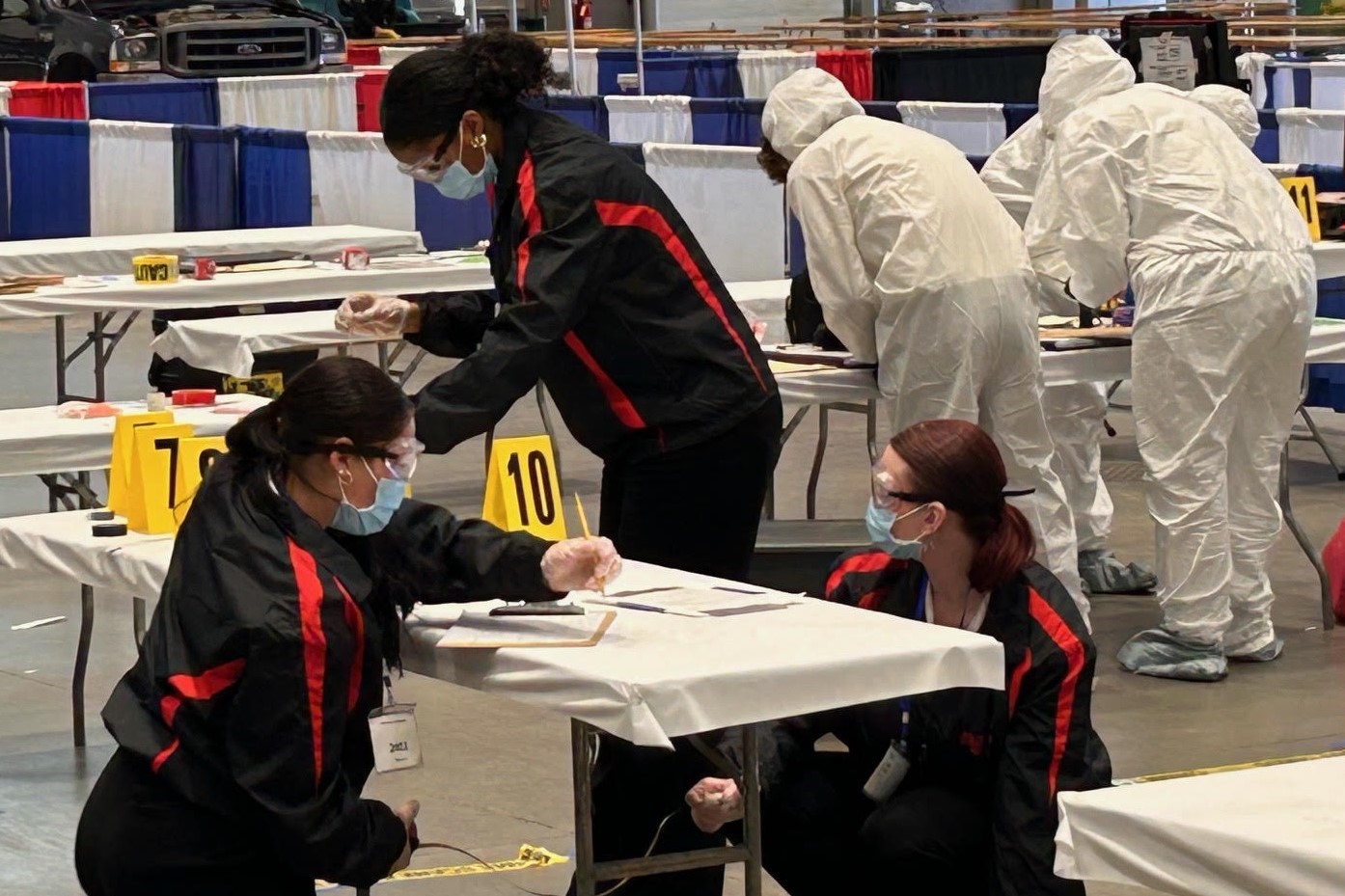 Criminal science students examine evidence during the New York State SkillsUSA competition.