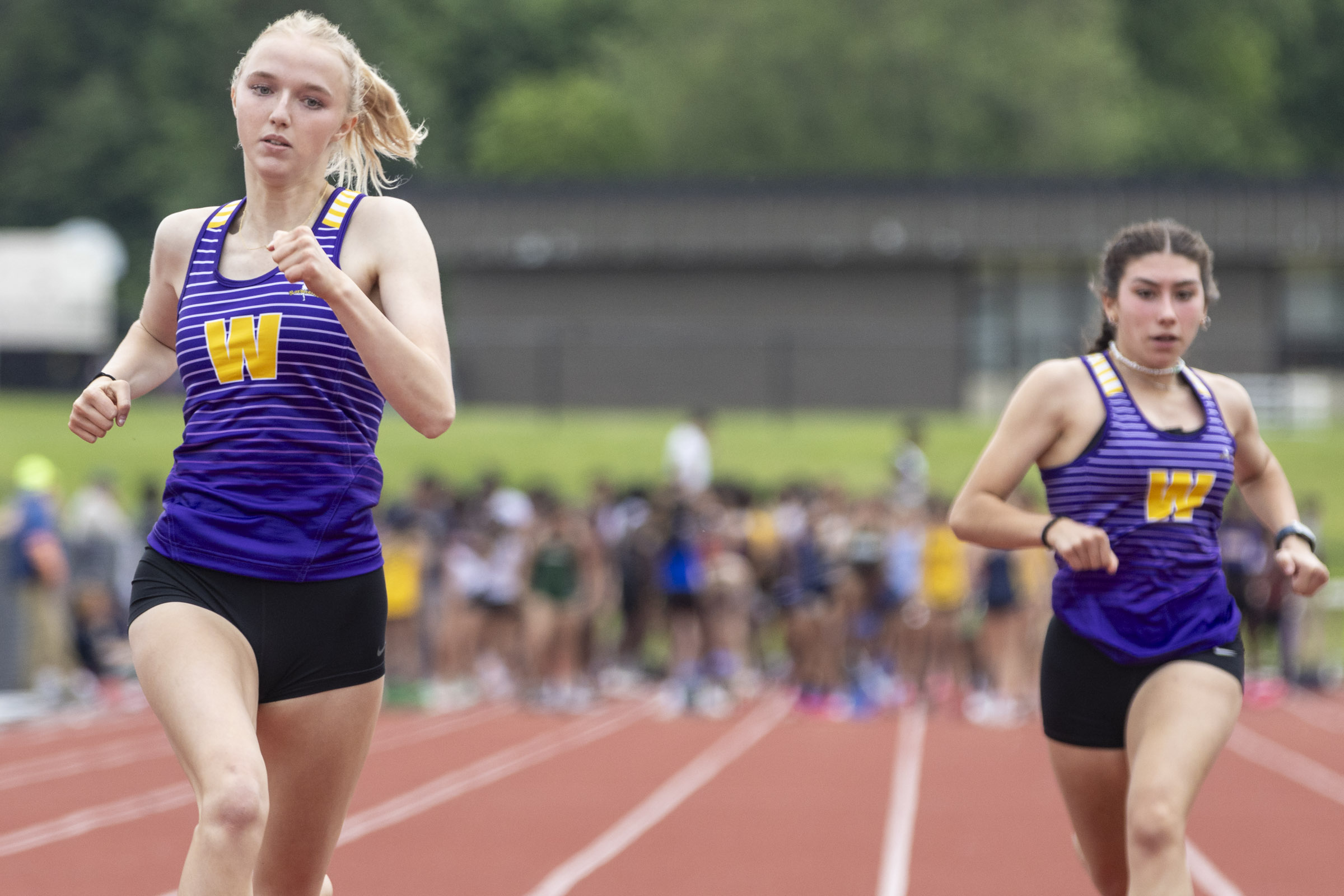 Warwick Valley athletes sprint to the finish line on day one of the OCIAA track and field championship meet at Tim St. Lawrence track.