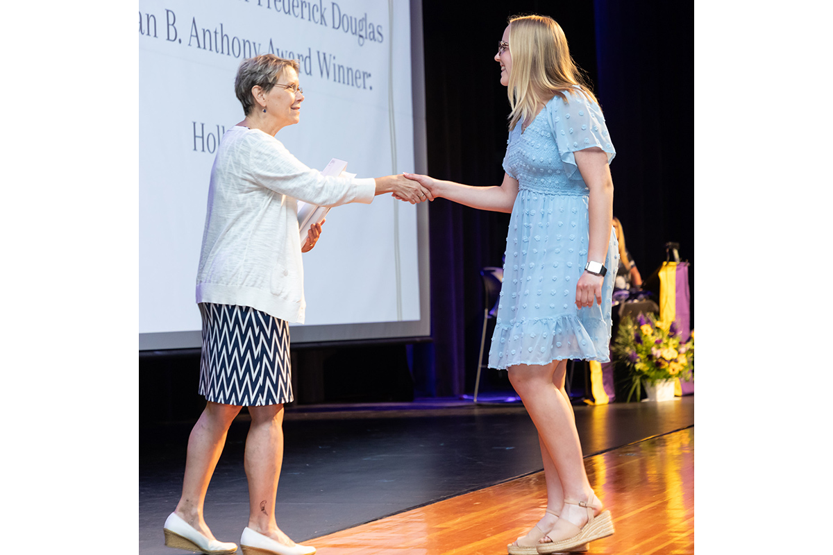 A student receives an award on the auditorium stage during Warwick Valley High School's 51st annual Awards Ceremony.