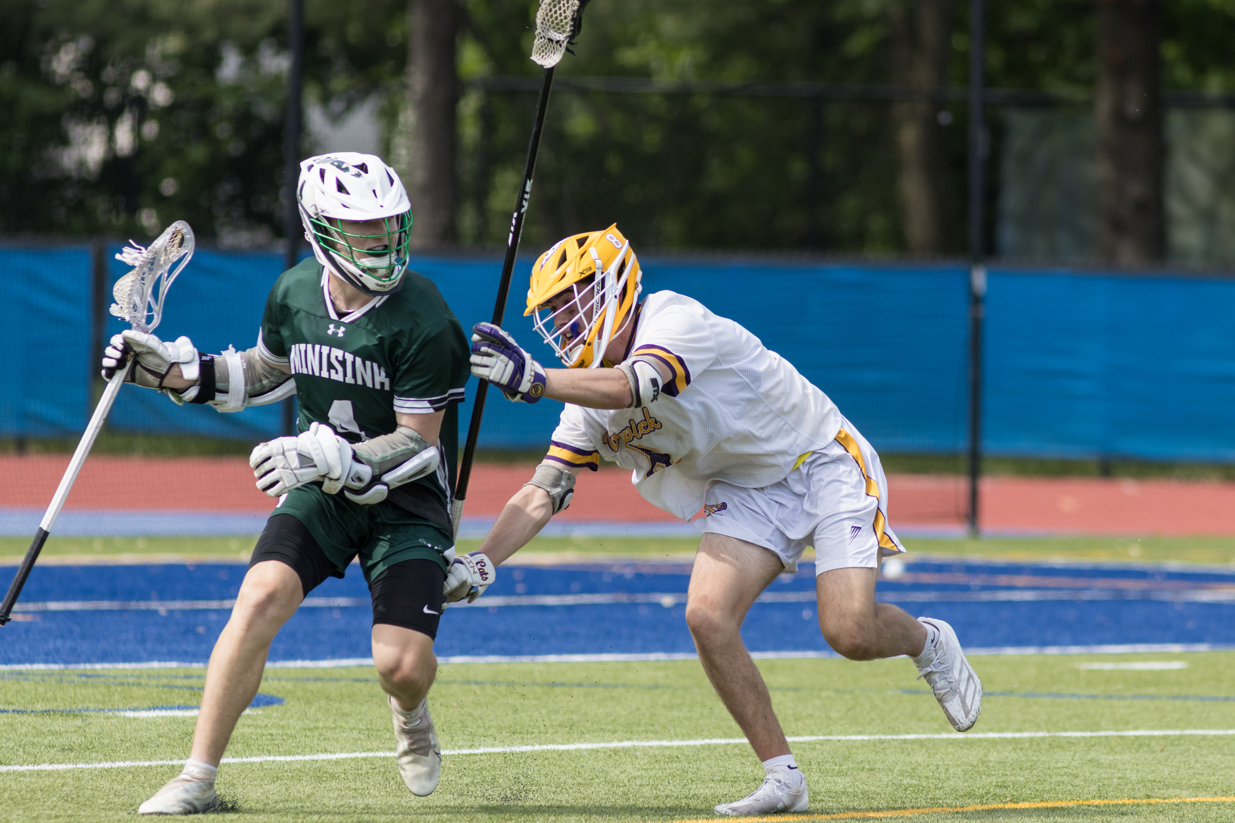 A Warwick Valley varsity boys lacrosse player defends a Minisink Valley player during the Section 9 Class B championship game.