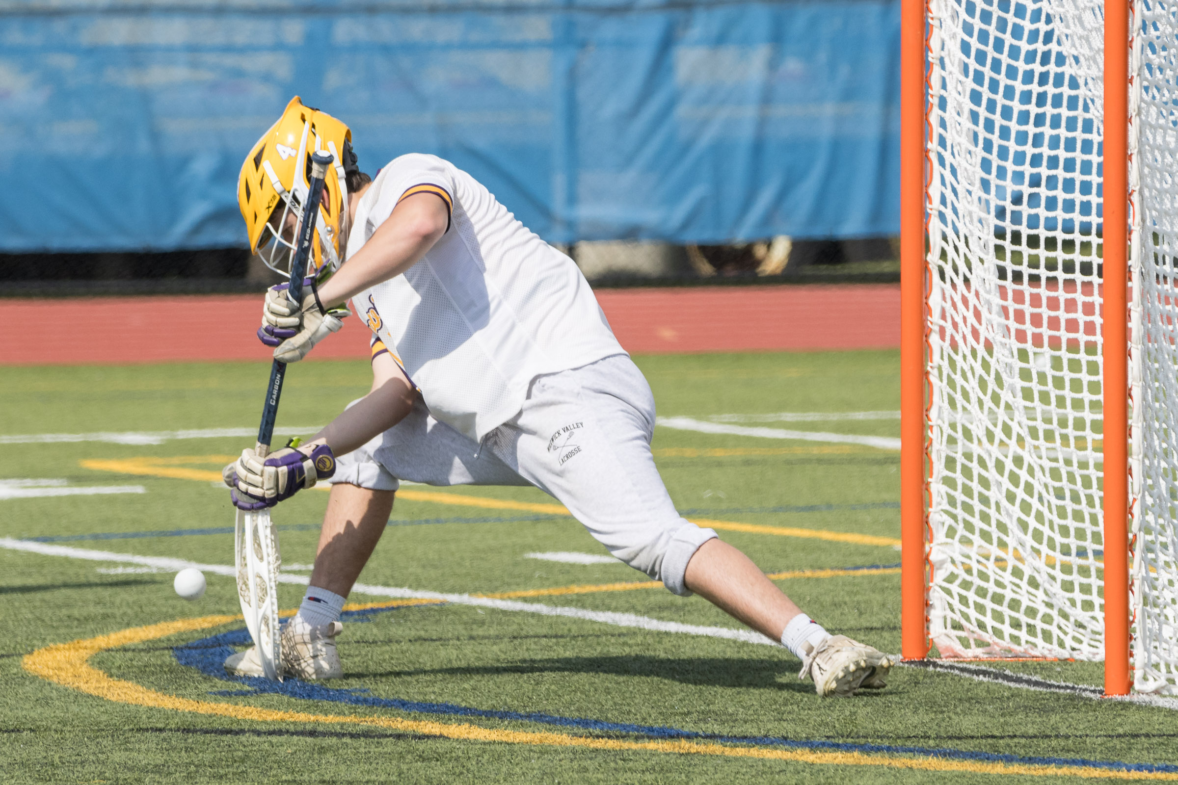 Warwick Valley varsity boys lacrosse goalie makes a save during the Section 9 Class B championship.