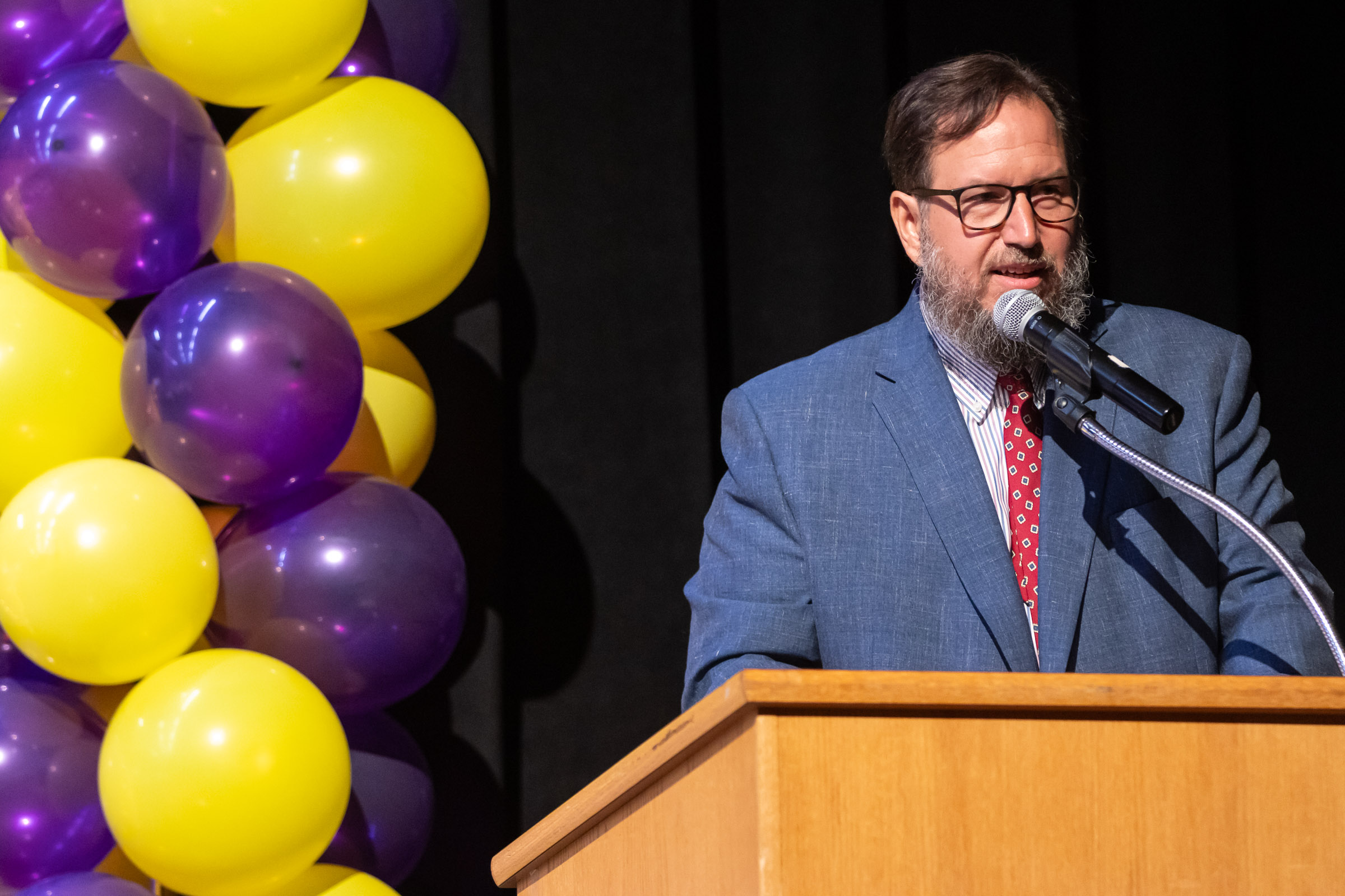 Principal William Biniaris speaks on stage during the Park Avenue Elementary School Fourth Grade Moving Up Ceremony in the WVHS auditorium