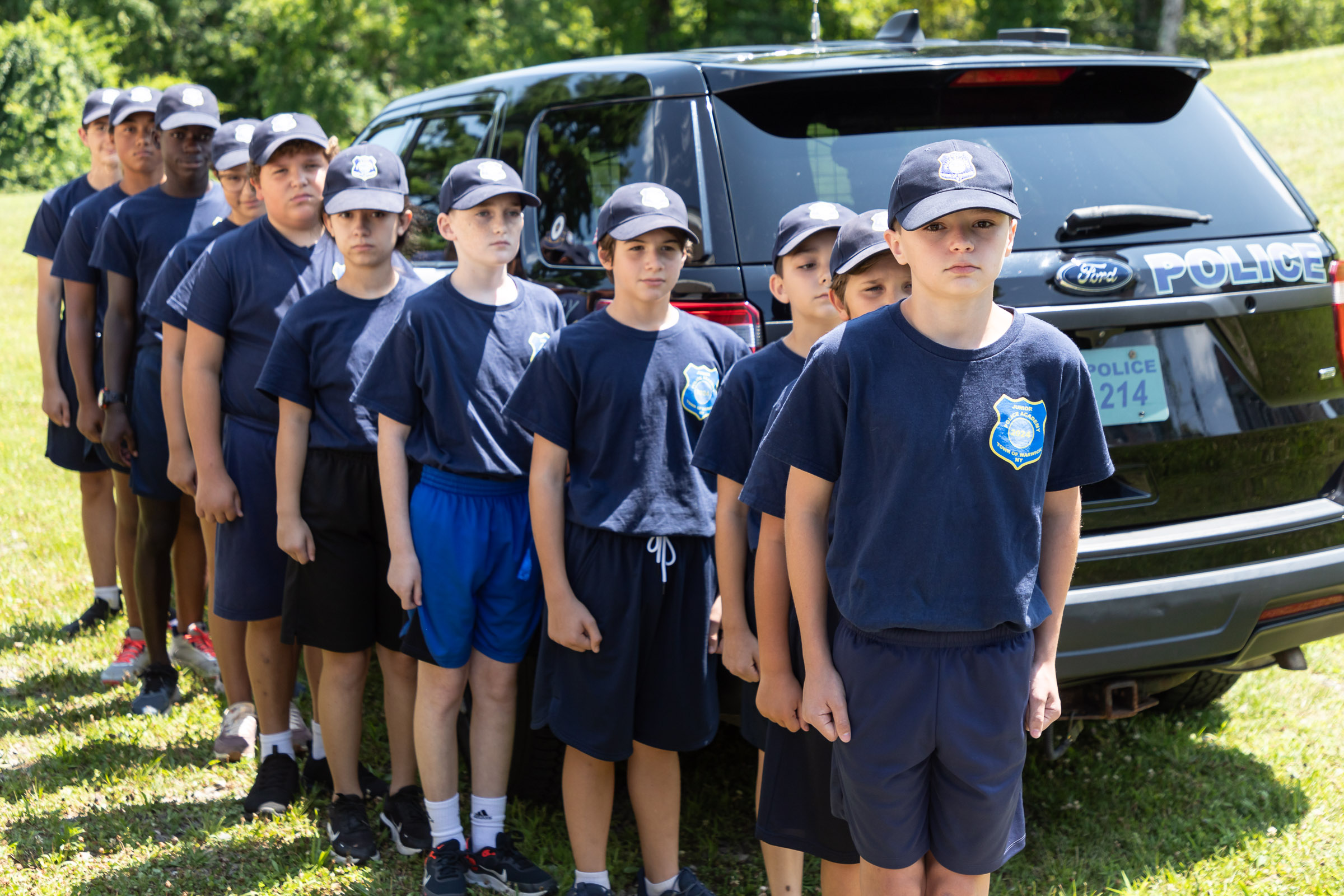 Cadets line up outside before the start of the Town Warwick Police Department Junior Police Academy graduation at Mountain Lakes Park.