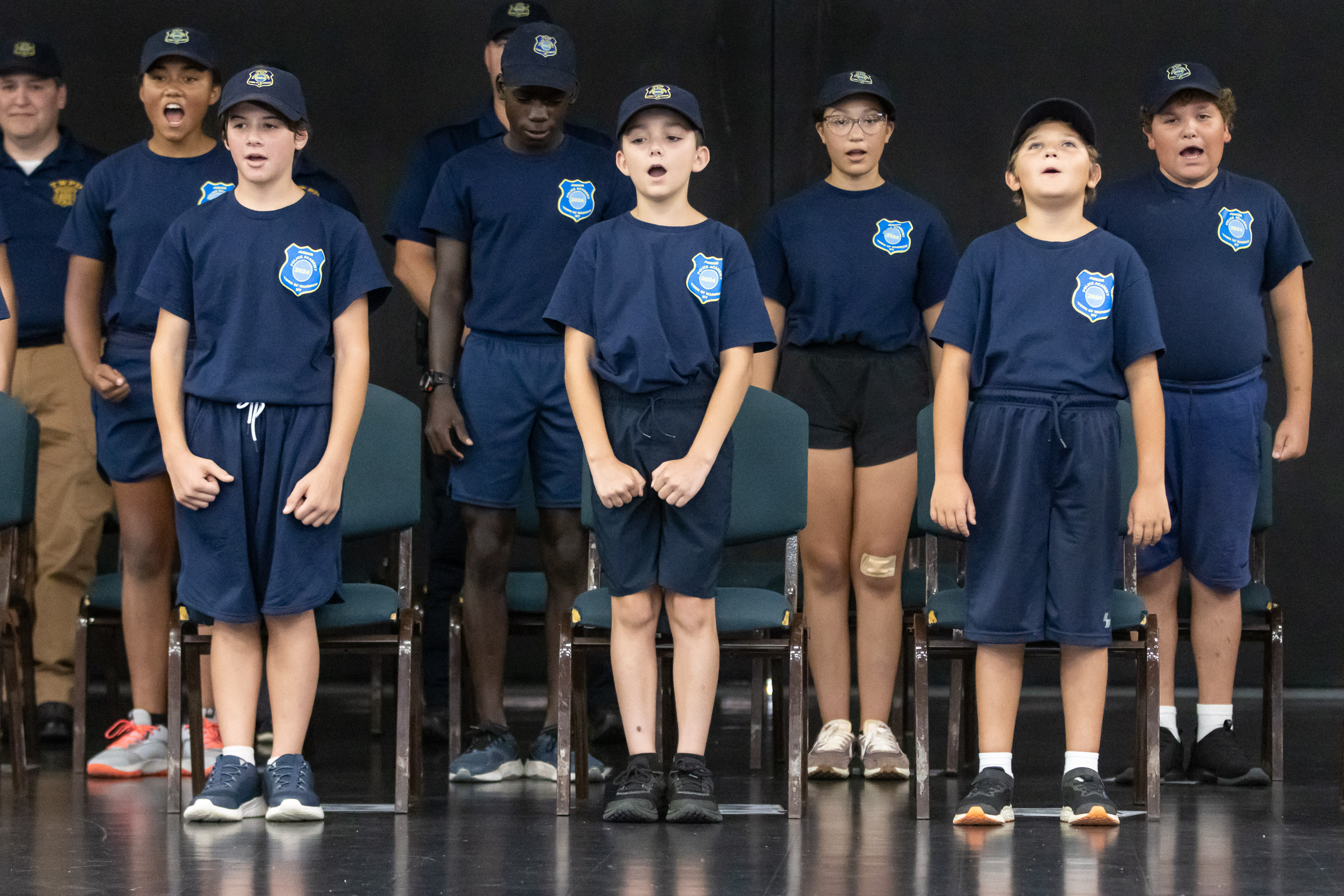 Cadets shout after being dismissed during their graduation from the Town of Warwick Police Department Junior Police Academy.