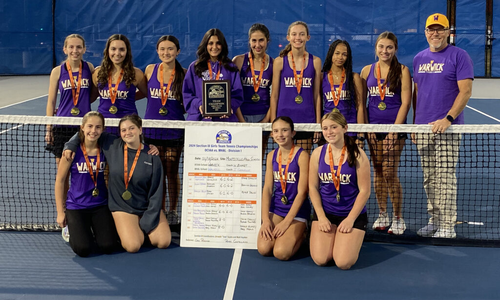 Warwick varsity girls tennis team with Section 9 Championship plaque.
