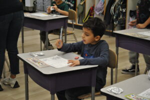 student sitting at desk