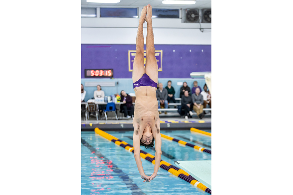 Warwick diver competes in a varsity meet against Goshen.