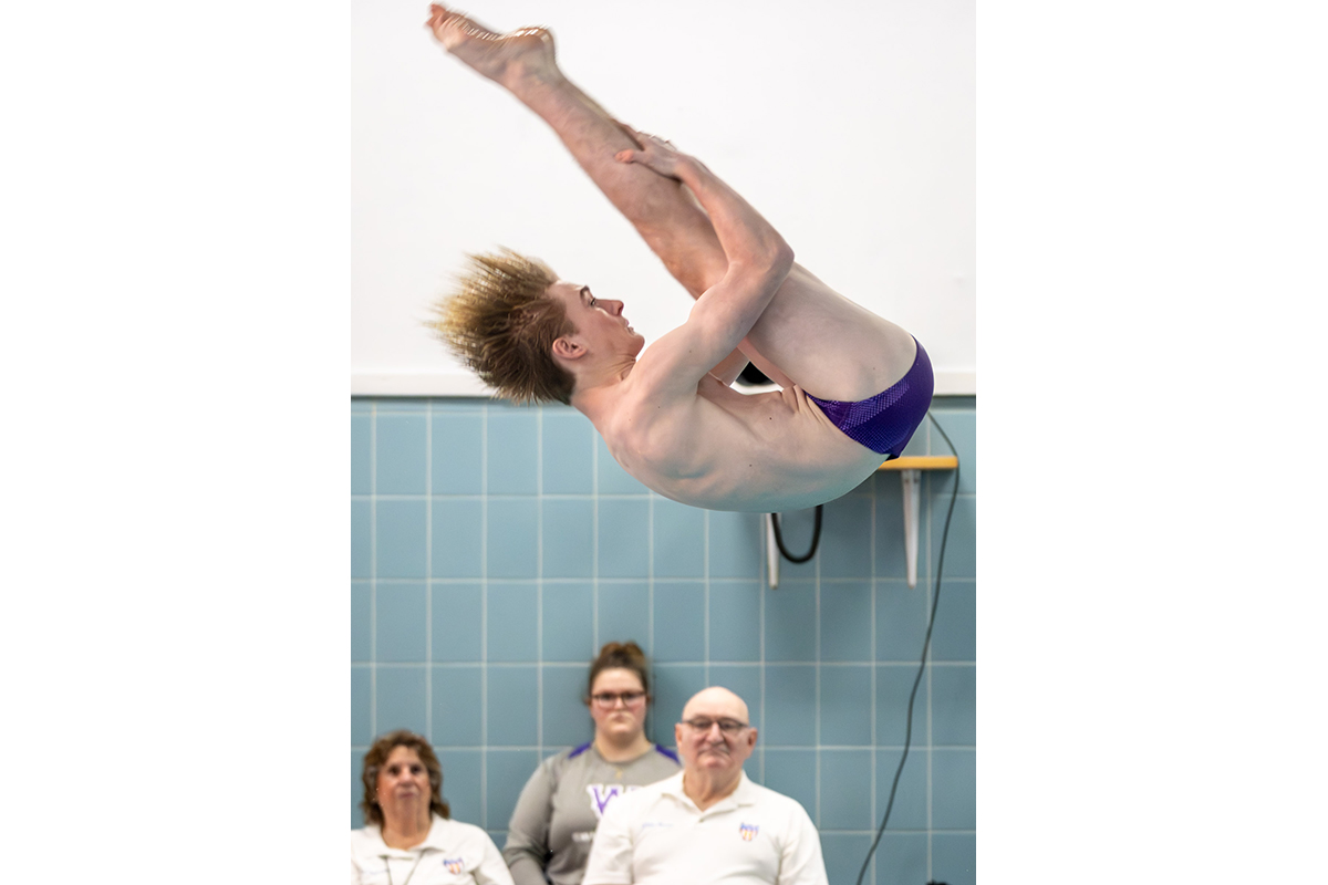 Warwick diver competes in a varsity meet against Goshen.