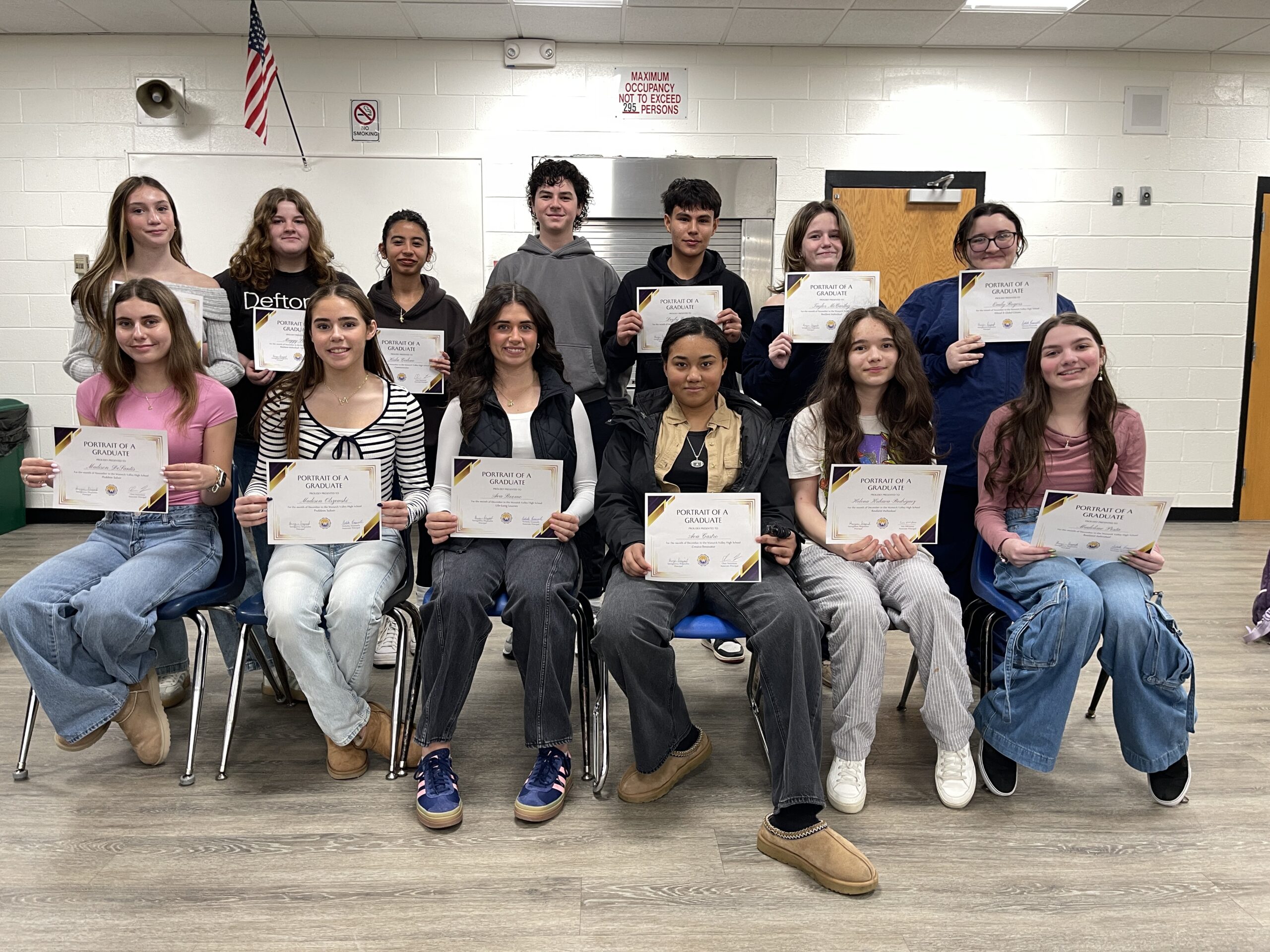 recipients of the warwick valley high school portrait of a graduate awards for november and december gather for a group photo