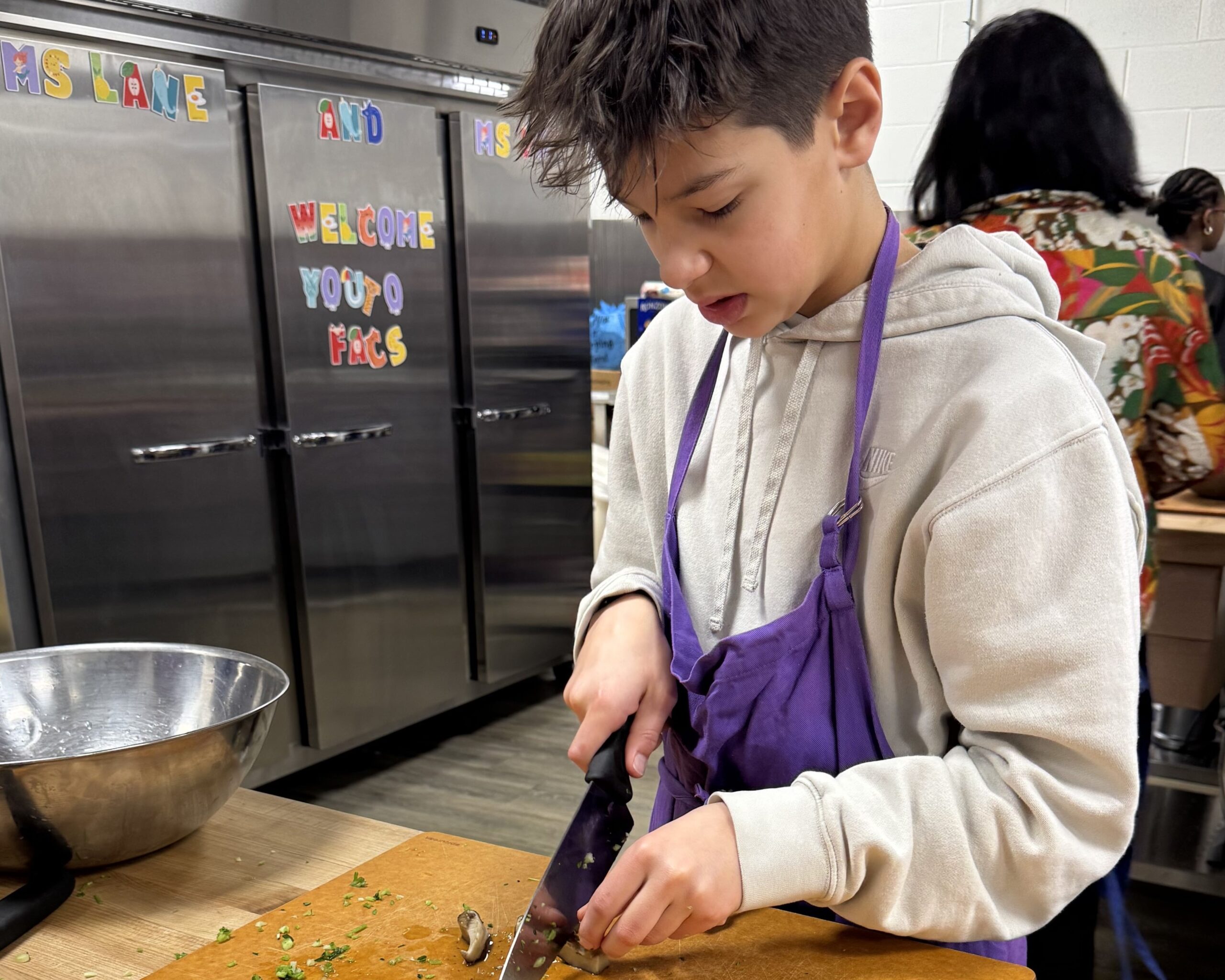 Students in Ms. Ping's Mandarin Chinese class prepare wontons.