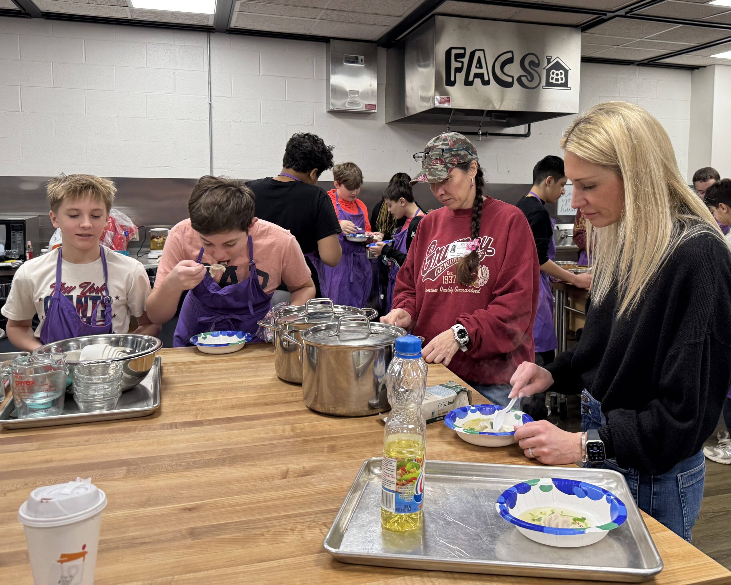 Students in Ms. Ping's Mandarin Chinese class prepare wontons.