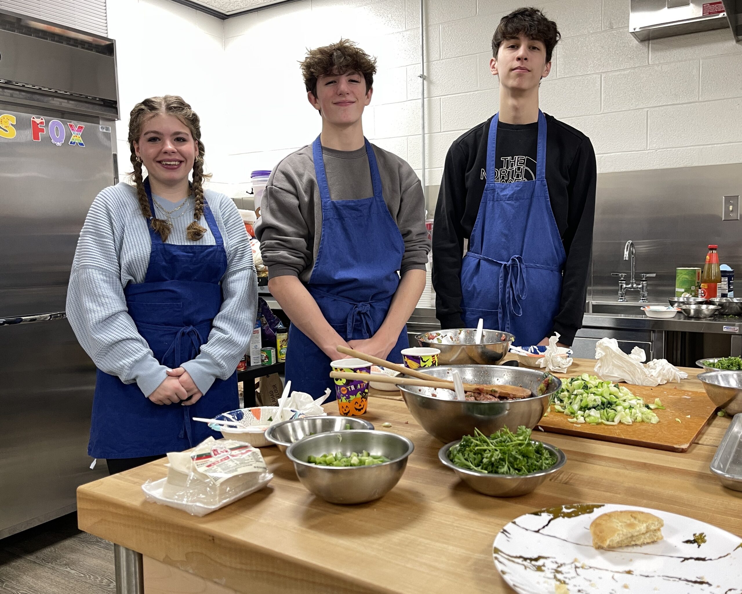 Students in Ms. Ping's Mandarin Chinese class prepare wontons.