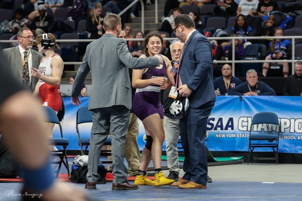 Warwick's Victoria Alvarado celebrates after winning the 152-pound girls wrestling state championship.